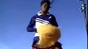 Black Vintage Cheerleader Teen Rides A Big